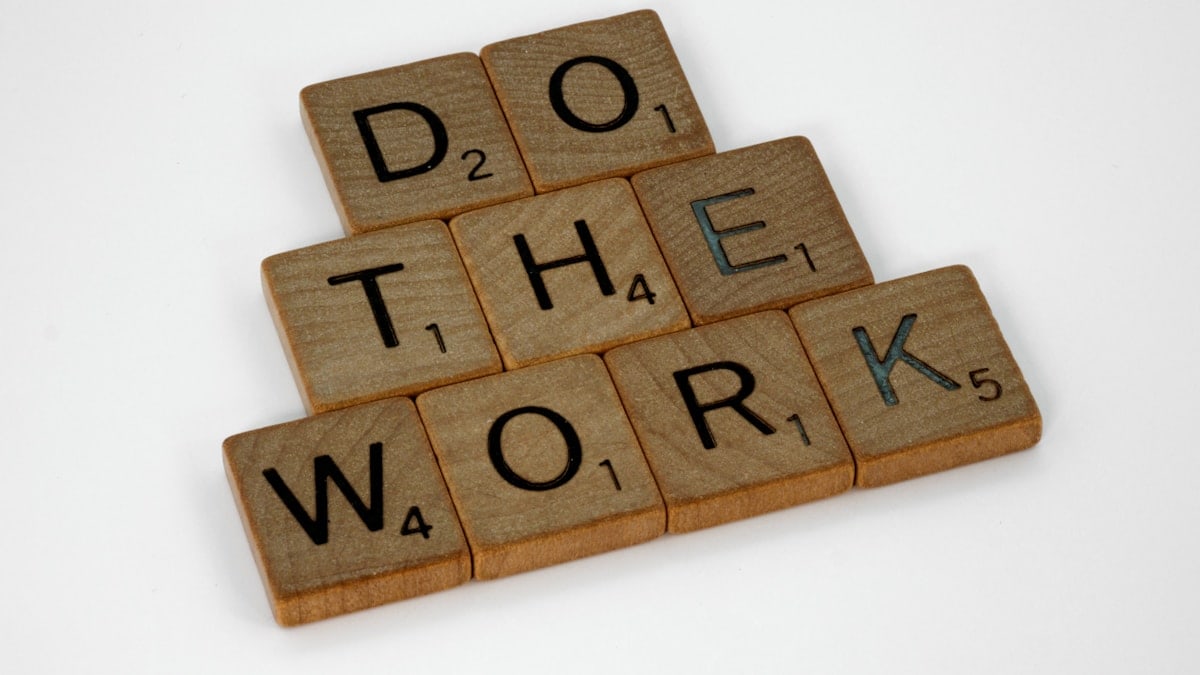 scrabble, scrabble pieces, lettering, letters, wood, scrabble tiles, white background, words, quote, letters, type, typography, design, layout, focus, bokeh, blur, photography, images, image, do the work, work, put in the hours, laziness, procrastination, nocrastination, do it, just do it, do it now, keep going, don't stop, persisistence, grind,